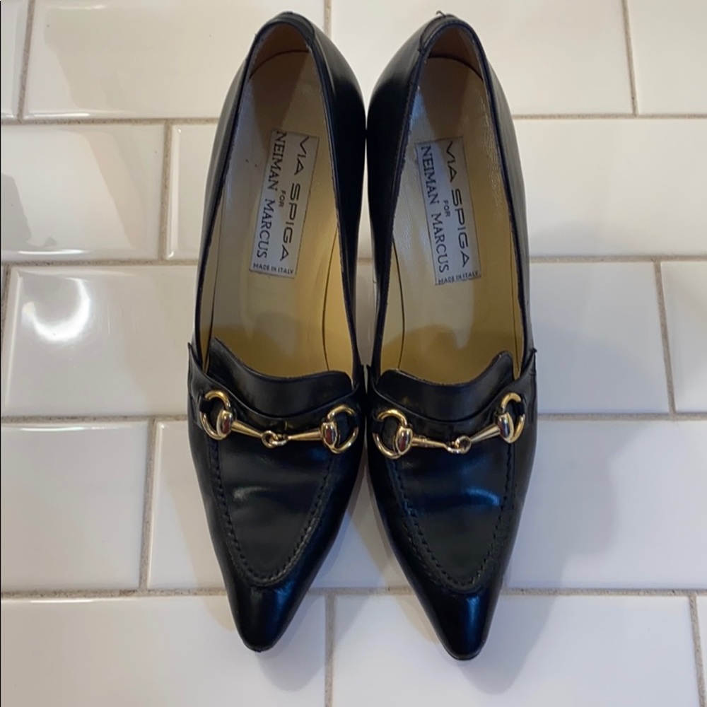 Black leather pumps